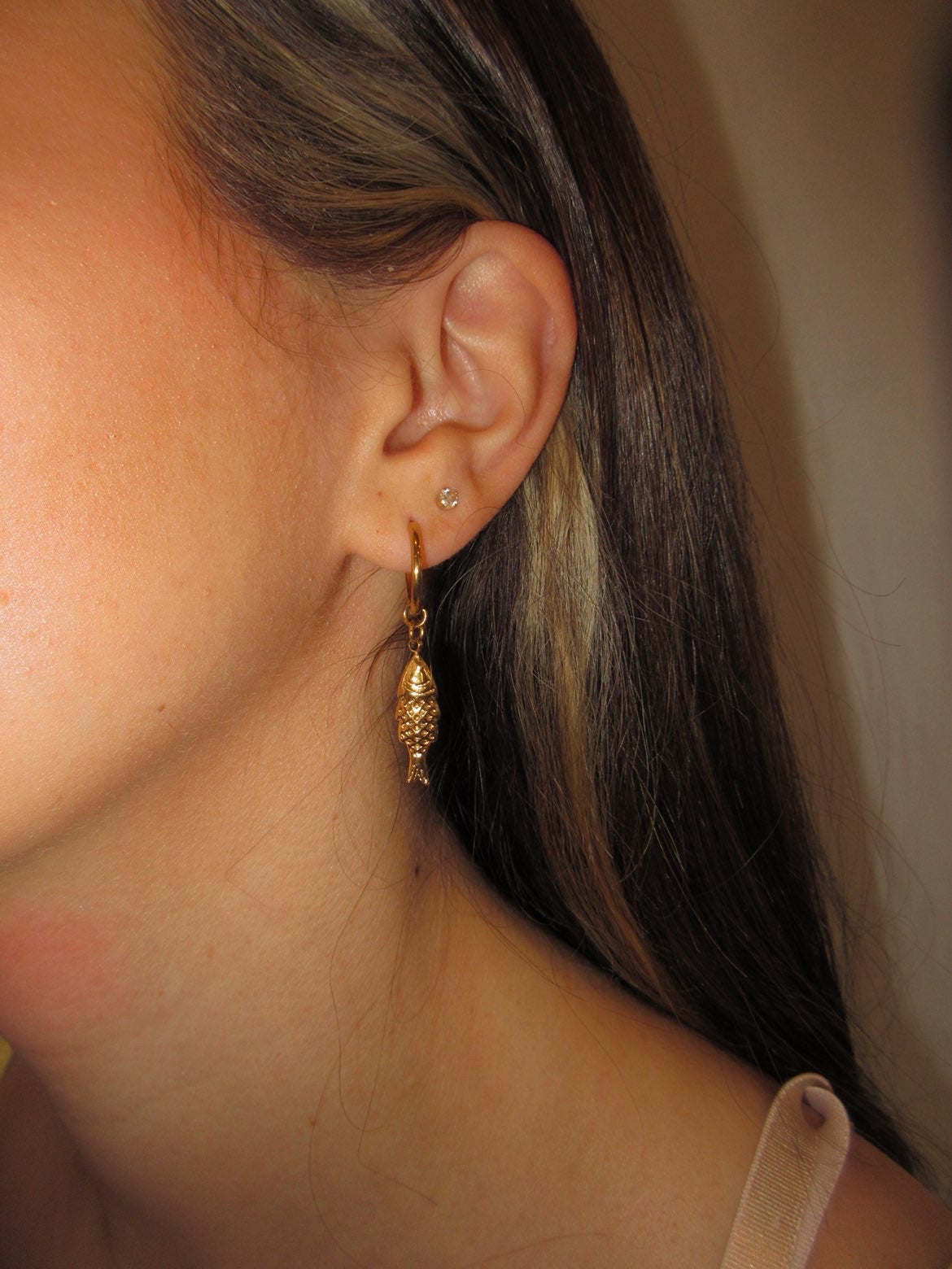 Fish huggie earrings